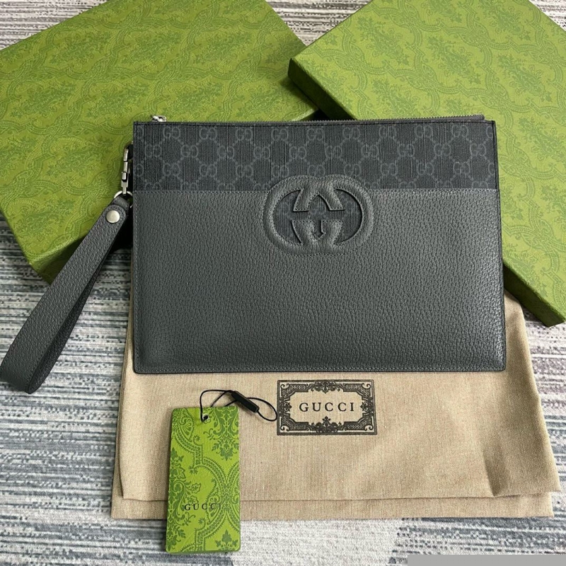 G*u*i clutch bags
